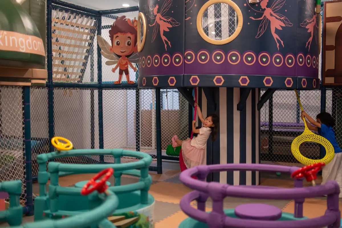 Wide view of the multi-level play structure at Play Kingdoms indoor playground
